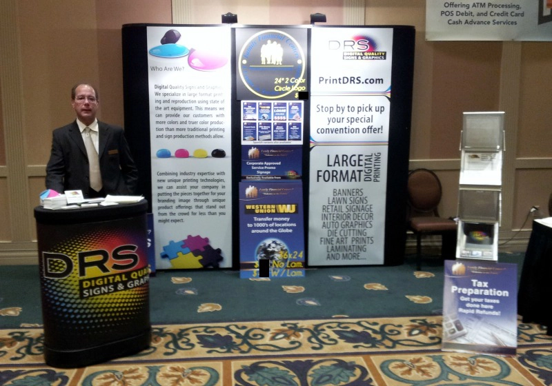 Mark with DRS Imaging and Print showcasing trade show booth design and services.